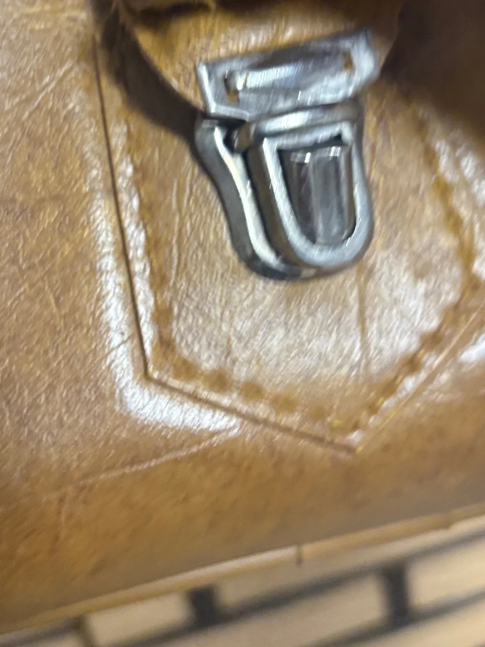 American tourister brown carry on bag